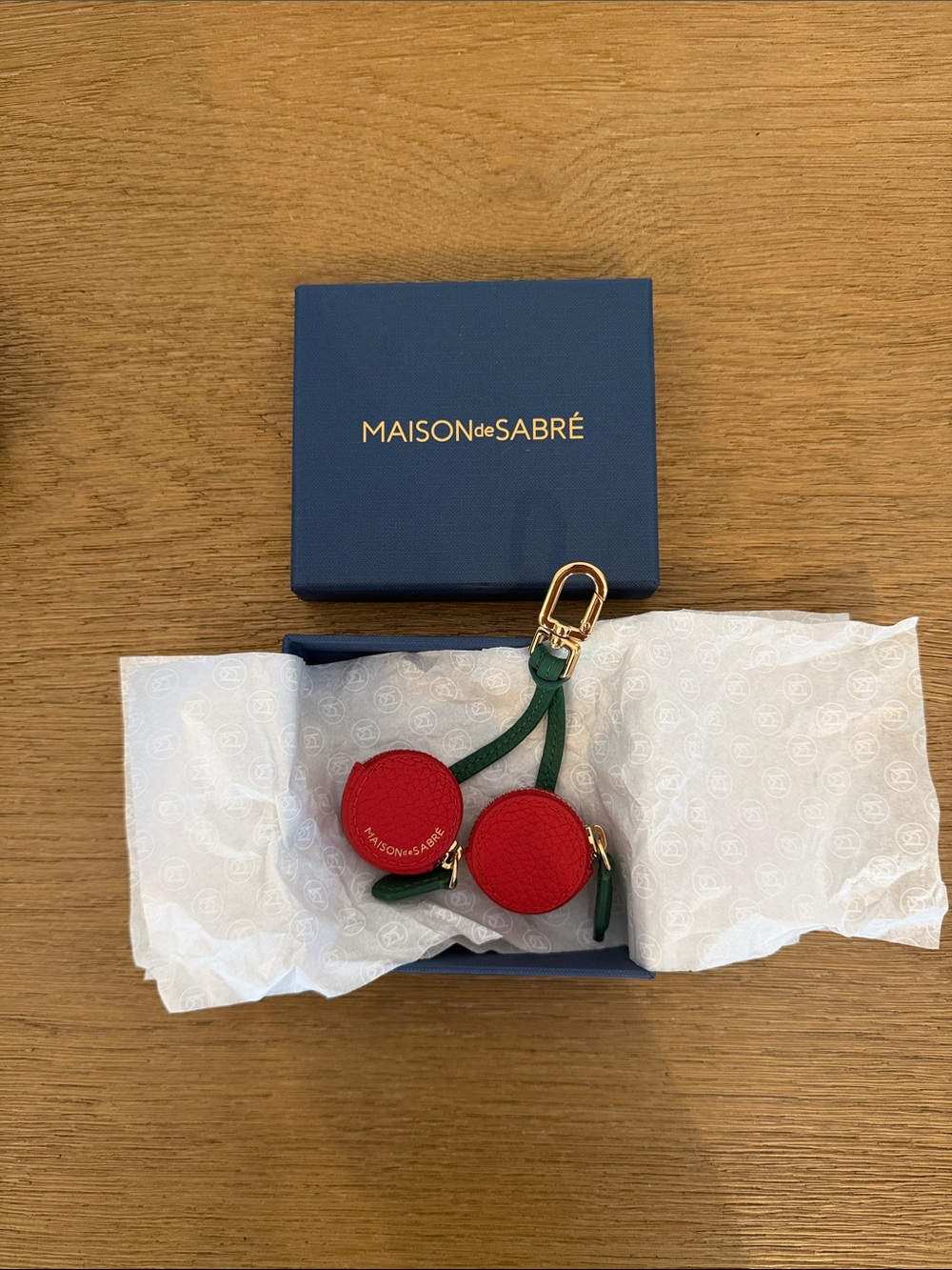 Maison de Sabré Red Leather Cherry Keychain with Green Strap